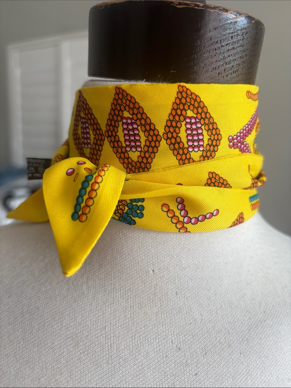 Hermes Yellow Silk Patterned Twilly Scarf with Pink and Teal Accents